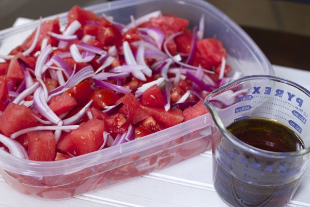 Fresh from Florida Tomatoes, watermelon onions and cheese create this refreshing Tomato Watermelon summer salad. 