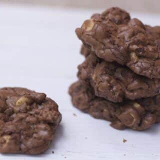 The ultimate chocolate cookie recipe filled with chocolate, peanut butter chips and nuts. You can just eat one of these chocolate peanut butter glob cookies