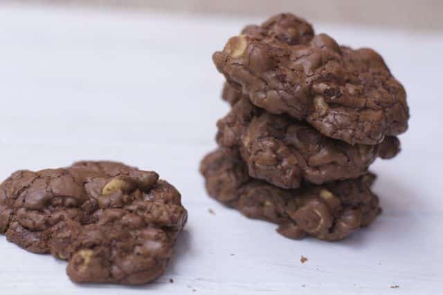 The ultimate chocolate cookie recipe filled with chocolate, peanut butter chips and nuts. You can just eat one of these chocolate peanut butter glob cookies