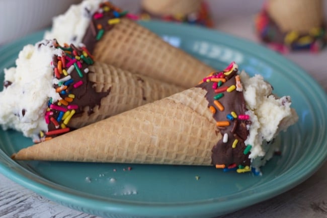 fun way to serve cannolis 3 ice cream cone filled with cannoli filling on a blue plate