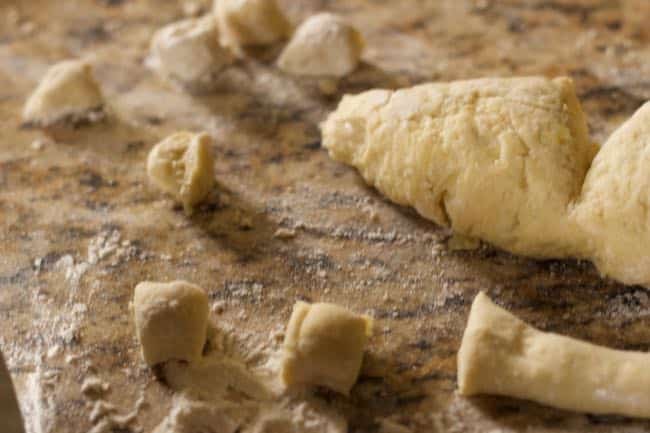 cutting homemade potato gnocchi